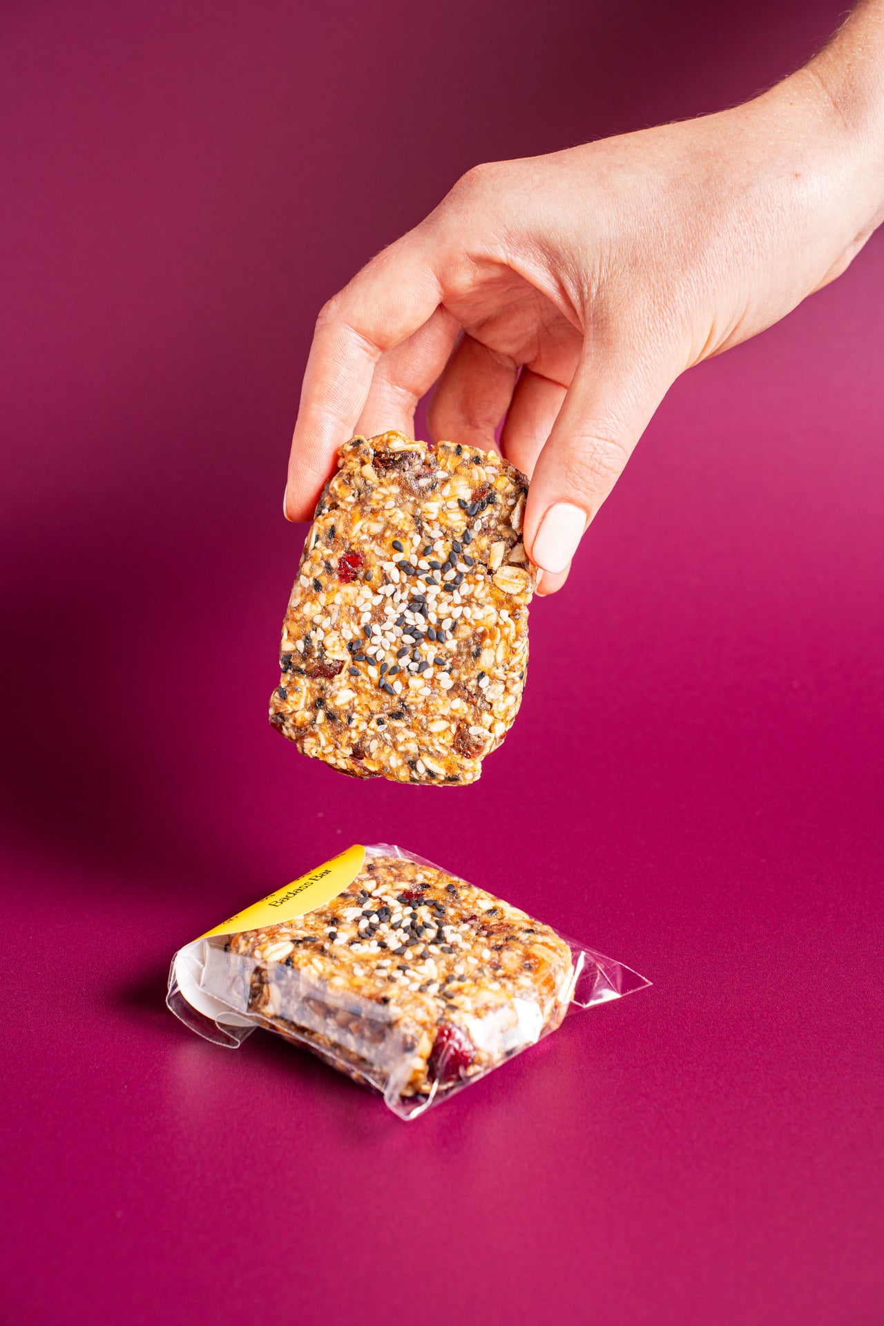 Badass Bar; Baked & Sweets, Snacks; Date, GF Oat, Almond, Walnut, Cashew, Cranberry, Raisin, Buckwheat, Chia, Sunflower Seed, Sesame, Cacao, Flax Meal, Cinnamon, Tapioca; Contains Sesame, Tree Nuts; A badass blend of nuts, seeds, and dried fruit—this bar means business.
