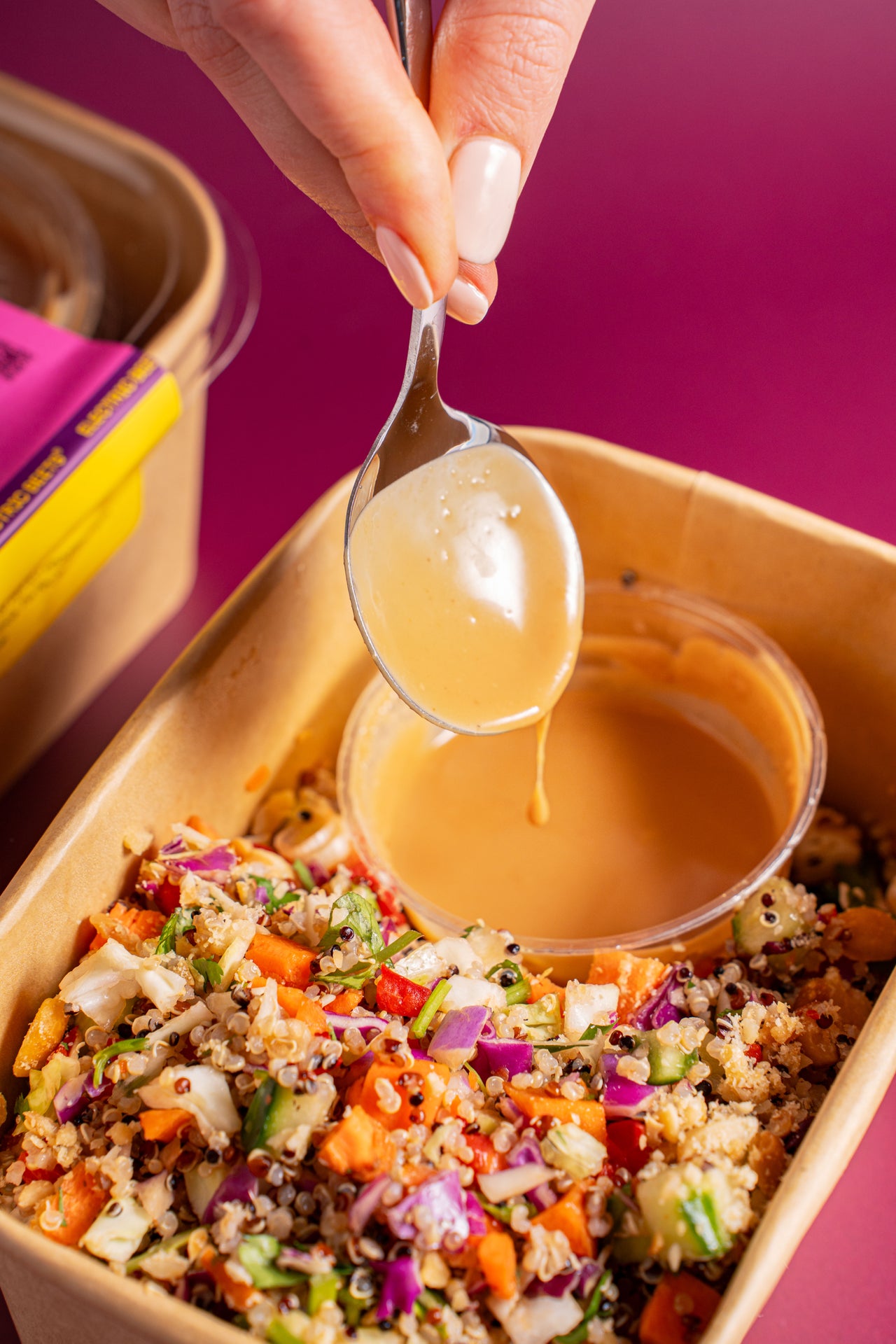 Crunchy Veggie Peanut Salad; Greens & Grains; Cabbage, Cucumber, Carrot, Quinoa, Bell Pepper, Peanut Butter, Tamari, Peanut, Rice Vinegar, Cilantro, Maple Syrup, Scallion, Sesame Oil, Garlic, Frontier Veg Broth, Sempio Gochujang; Contains Peanuts, Sesame, Soy; Fresh, crunchy, and full of vibrant veggies, perfectly paired with our delicious Peanut Sauce!