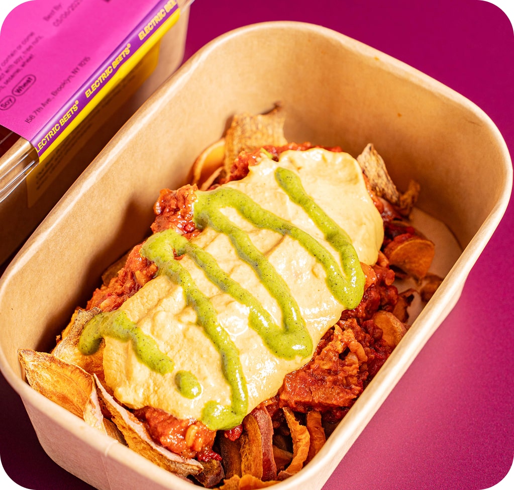 Enchilada; Hearty; Sweet Potato, Mushroom, Tomato, Vit Wht Glutn, Onion, Beet, Br Rice, Nutr Yeast, Sunflower Seed, Chipotle, Tamari, Olive & Avo Oil, Chili Pwdr, Jalapeno, Cilantro, Chickpea Miso, Carrot, Lemon, Frontier Veg Broth, Scallion, Tapioca, Horseradish, Black + White Ppr, Cumin, Garlic, Basil, Parsley, Paprika, Cayenne, Turmeric, Allspice, Thyme, Salt; Contains Soy, Wheat; Our Beet Burger, roasted sweet potato, Sunflower Cheese, and chimichurri come together in this spicy, vibrant showstopper.