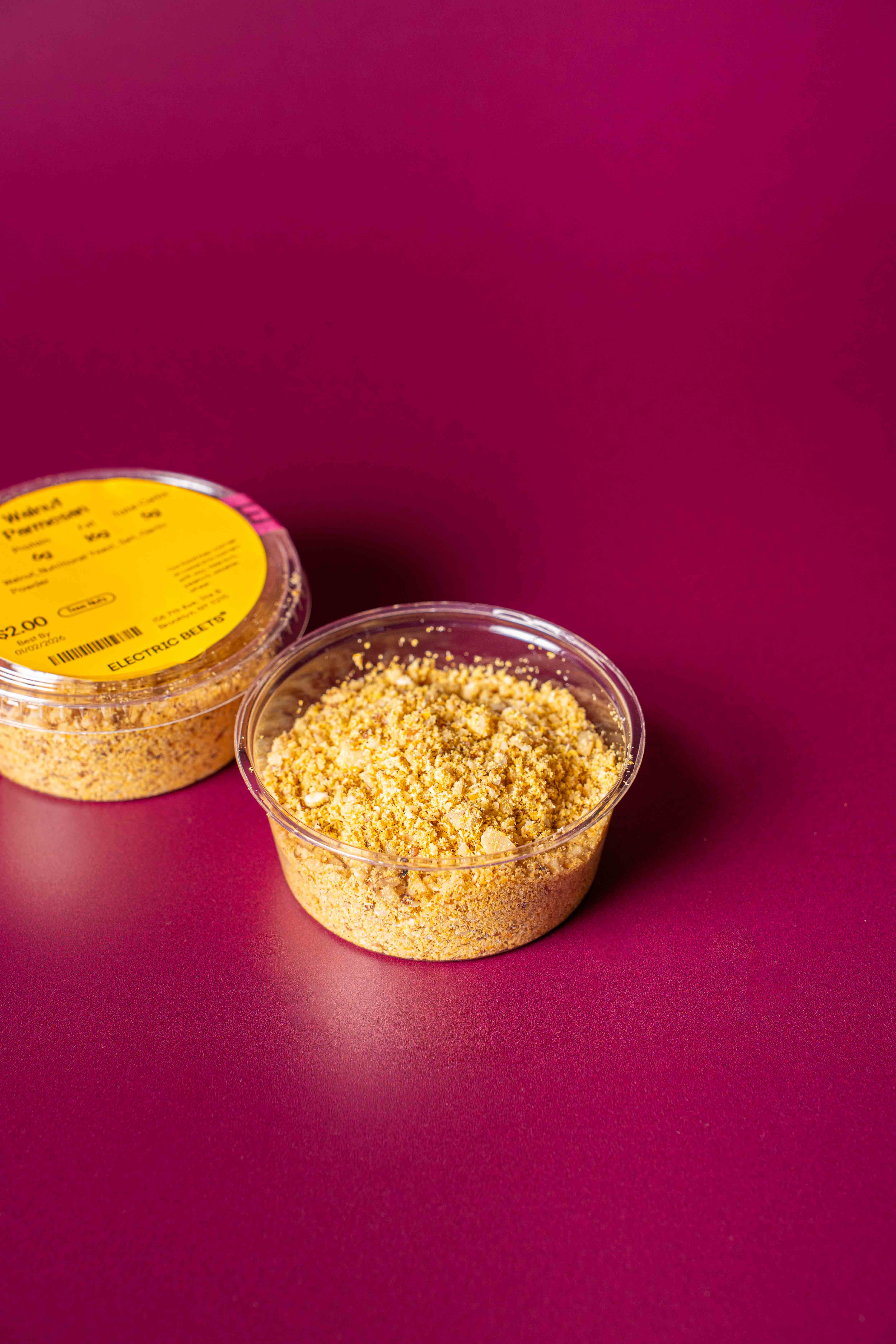 Walnut Parmesan - Extra Topper; Condiments; Walnut, Nutritional Yeast, Salt, Garlic Powder; Contains Tree Nuts; Savory, cheesy, and absolutely addictive. Sprinkle on anything for an extra yummy boost.