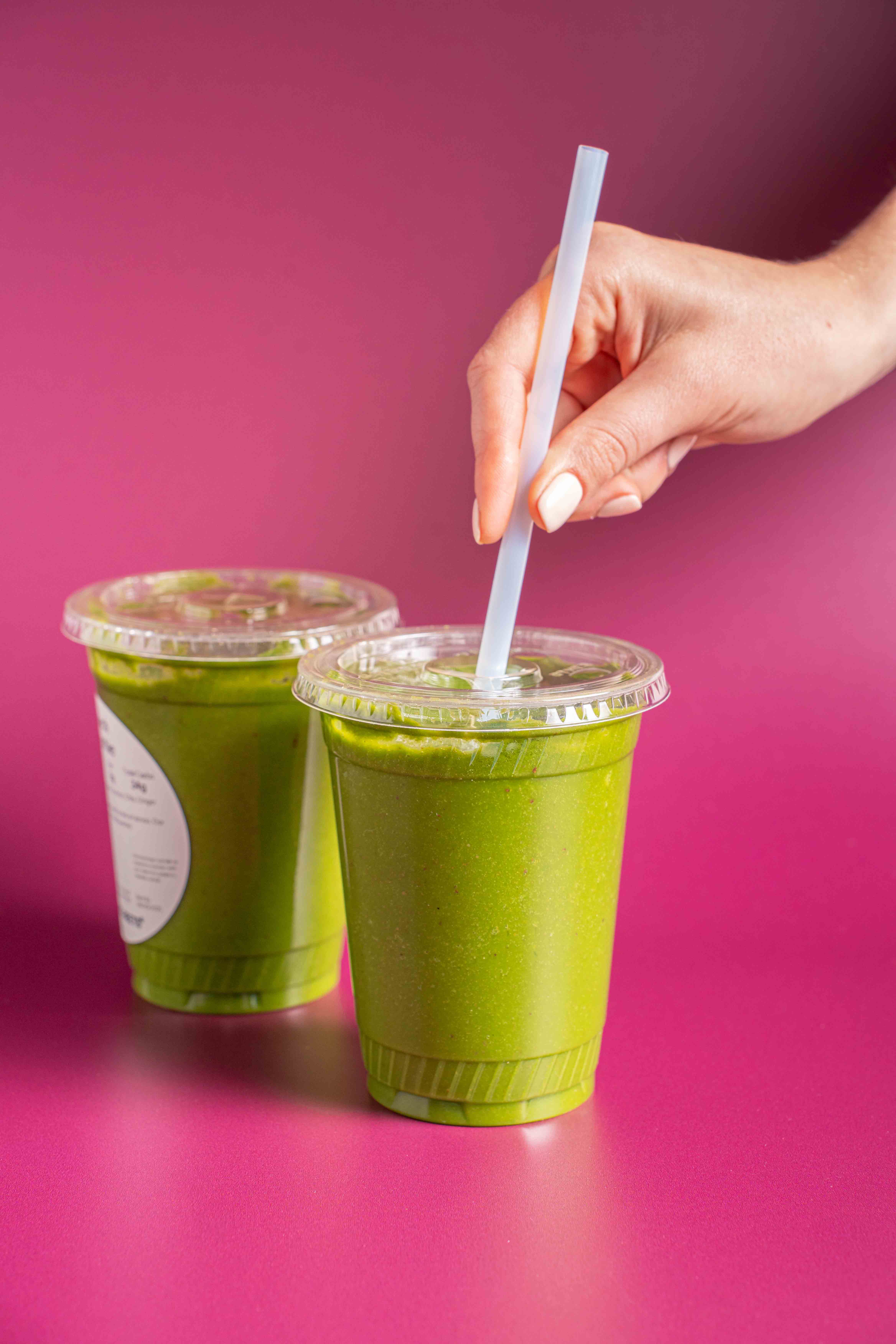 Green spinach smoothie, nutrient dense, best-selling drink for convenient plant-based hydration. Kid favorite in Park Slope. Clean eating.